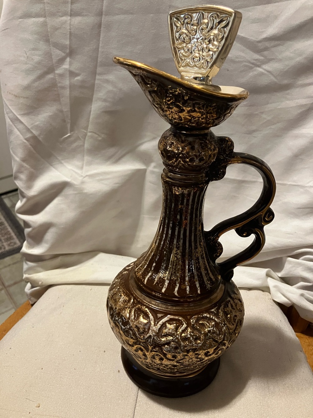 Vintage 1980 Regal China Co gold ,bronze Jeanie “. Style wine bottle. Perfect